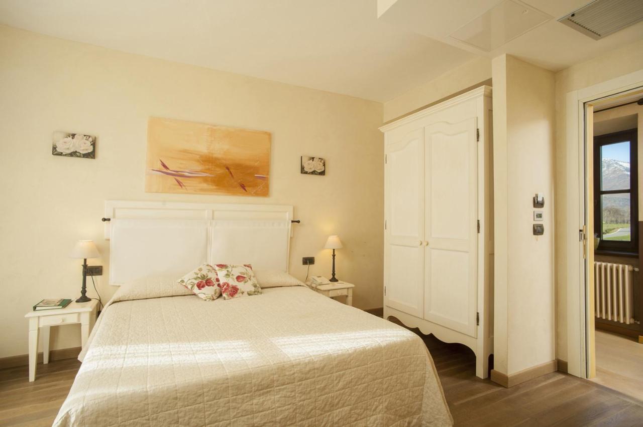Relais Bella Rosina Pool & Spa La Cassa Pokoj fotografie